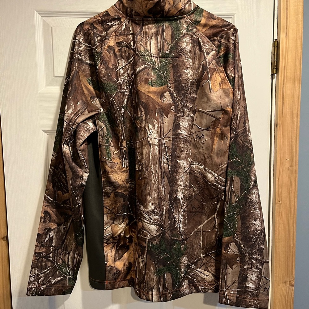 Under armour real tree camo pull over.  New with tags